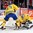 PRAGUE, CZECH REPUBLIC - MAY 9: Sweden's Jhonas Enroth #1 makes the save while Oliver Ekman-Larsson #23 defends during preliminary round action against Switzerland at the 2015 IIHF Ice Hockey World Championship. (Photo by Andre Ringuette/HHOF-IIHF Images)


